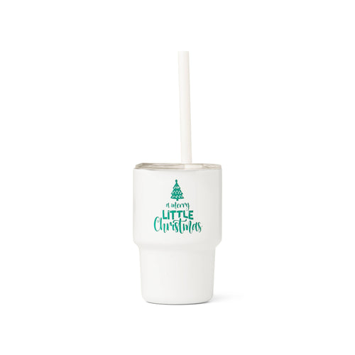 White tumbler with 'a very little Christmas' text and a tree design on a white background