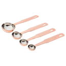 Four copper measuring spoons, arranged by size on a plain white background.