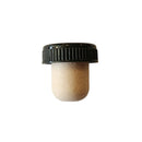 Small bottle stopper with a black lid on a white surface