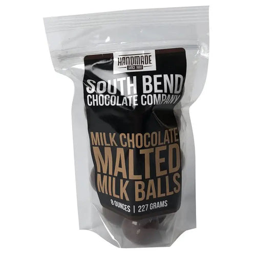 Packaged milk chocolate malted milk balls from South Bend Chocolate Company on a white background