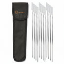 A set of stainless steel paddle skewers with flat handles, accompanied by a dark canvas storage bag with the 'Outset' brand on it.