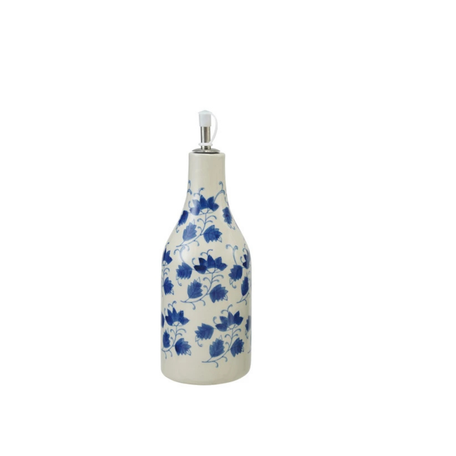 Decorative bottle with blue floral pattern on a white background