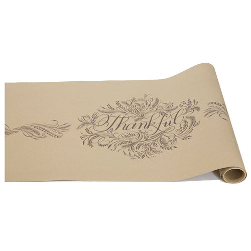 Roll of paper with 'Thankful' text and decorative elements on a white background
