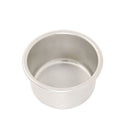 A four inch round cake pan on a white background.