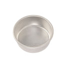 A 6 inch round Nordic Ware cake pan made of aluminum on a white background.