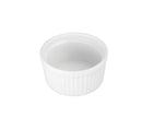 A white ceramic ramekin with vertical ridges.