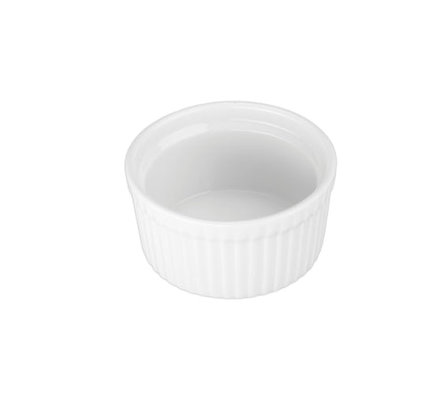 A white ceramic ramekin with vertical ridges.