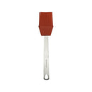 A mini basting brush with a stainless steel handle and red silicone bristles on a white background.