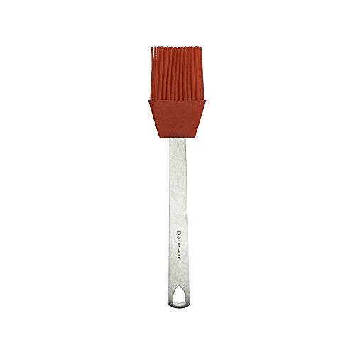 A mini basting brush with a stainless steel handle and red silicone bristles on a white background.