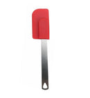 A red mini spatula with stainless steel handle on a white background.