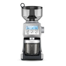 A Breville Smart Grinder Pro with a digital display, stainless steel body, and a clear grinding container.