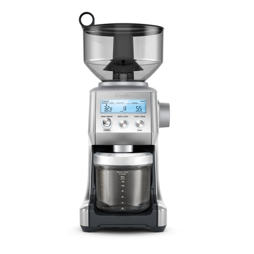 A Breville Smart Grinder Pro with a digital display, stainless steel body, and a clear grinding container.
