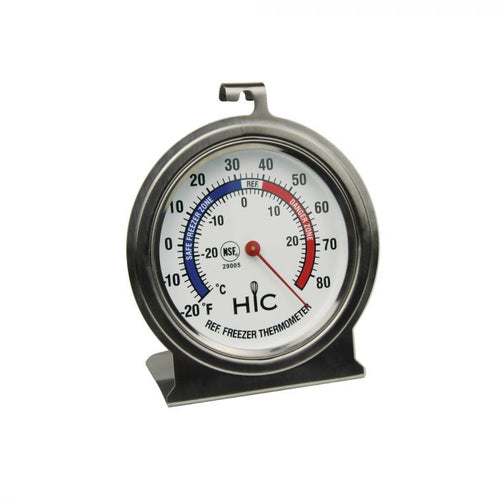 A silver refrigerator/freezer thermometer with a dial showing temperature ranges in both Fahrenheit and Celsius, and a stainless steel casing.