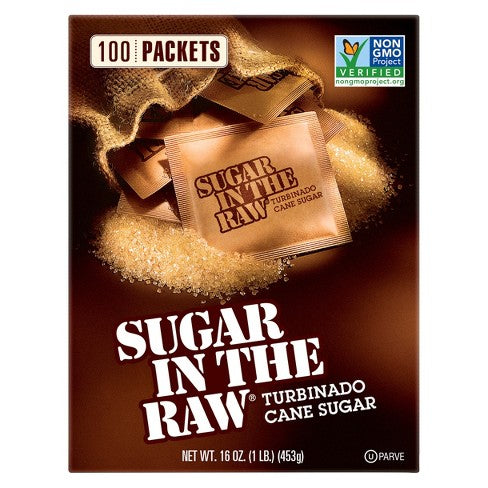 Packaging for Raw Sugar In The Raw Turbinado Cane Sugar, with a picture of raw sugar crystals and a box that indicates 100 packets, non-GMO verified, and gluten-free.