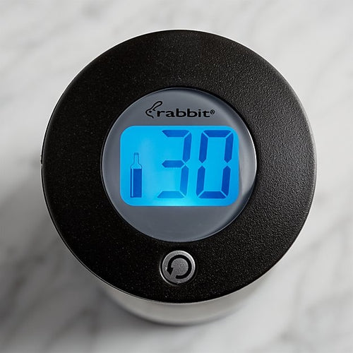 The digital readout of a Rabbit electric corkscrew showing the number of corks it can remove with a black circular border.