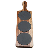 Acacia wood serving board with three slate sections, suitable for serving appetizers or cheese.