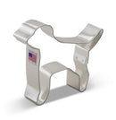 A stainless steel cookie cutter in the shape of a Labrador dog, with a visible American flag sticker stating it was made in USA.