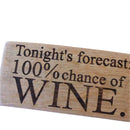 Wooden sign with engraved text 'Tonight's forecast: 100% chance of WINE' on a dark background