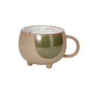 A beige and green ceramic mug with a duo-toned glazed and speckled finish, featuring an ergonomic handle.
