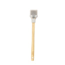 Basting brush with wooden handle and white silicone head with holiday phrase on it.