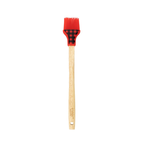 Basting brush with wooden handle and red silicone head with black plaid pattern.