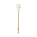 Basting brush with wooden handle and white silicone head with snowflake design.