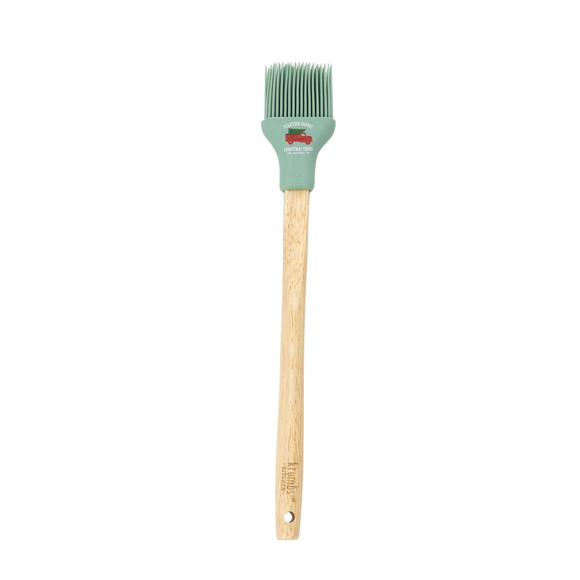 Basting brush with wooden handle and green silicone head with little red truck design.