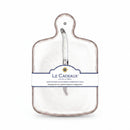 A white cheese board with a white knife attached to it, packaged with a label displaying the brand name and product details.