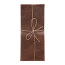 A brown leather cutlery sleeve with a tie and a loop for holding utensils.