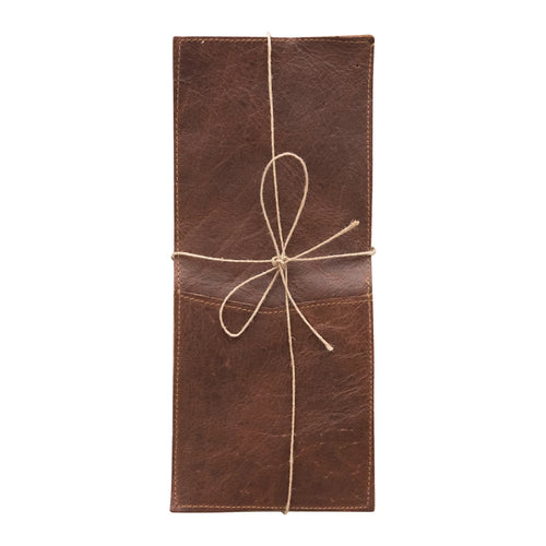 A brown leather cutlery sleeve with a tie and a loop for holding utensils.