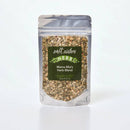 A bag of salt sisters Mama Mia Herb Blend spices on a white background.