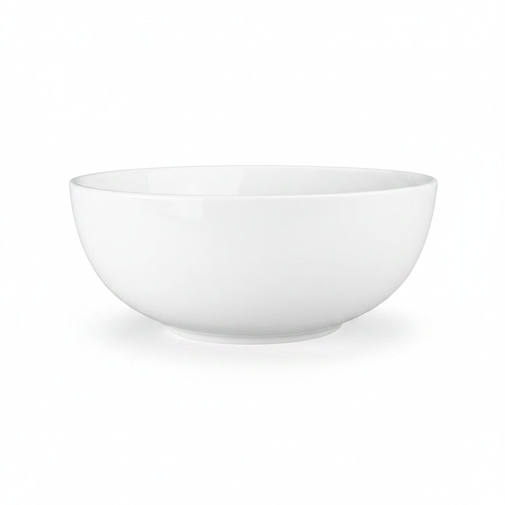 A white, round ceramic serving bowl.
