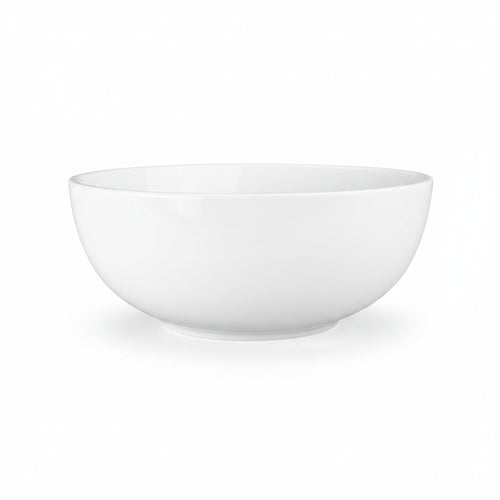 A white, round ceramic serving bowl.
