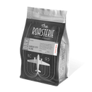 A pack of The Roasterie Kansas City Dark Coffee, showing the brand logo, and the type of coffee.